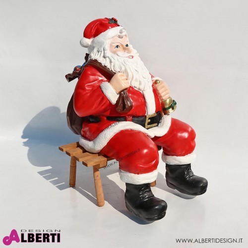 Babbo Natale in vetroresina su panca, con sacco regali H58 cm