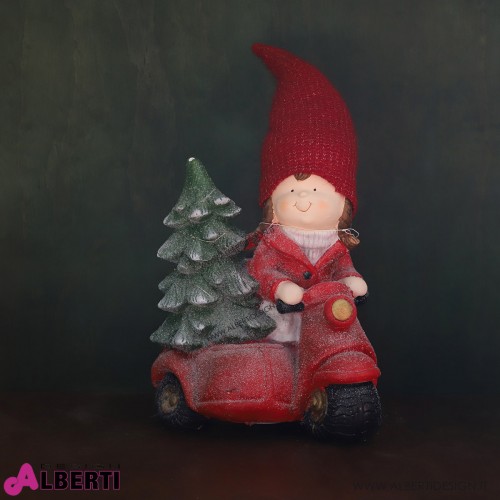 Bimba su scooter con albero di Natale H 50cm